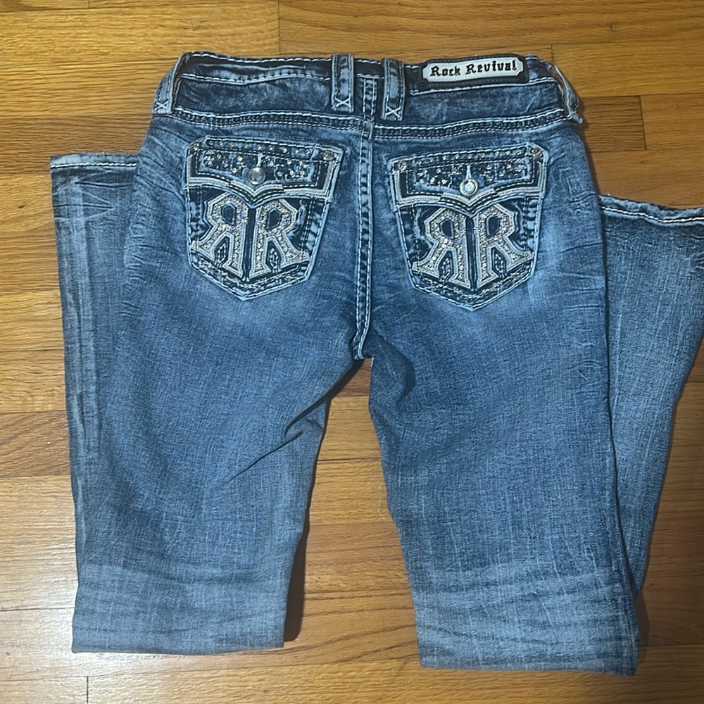 Rock Revival Blue Boot Cut Jeans with Ornate Detailing